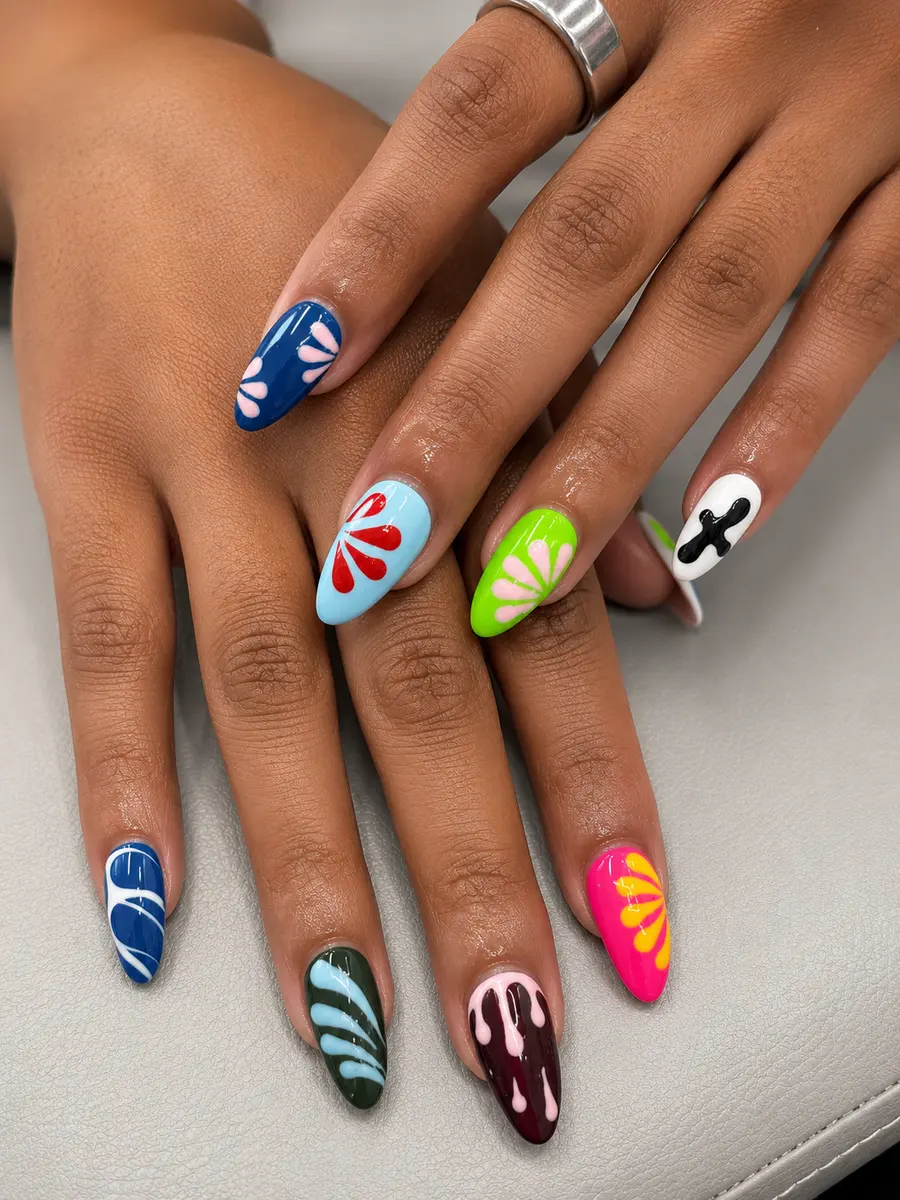 Stiletto nails with colorful hand-painted floral designs